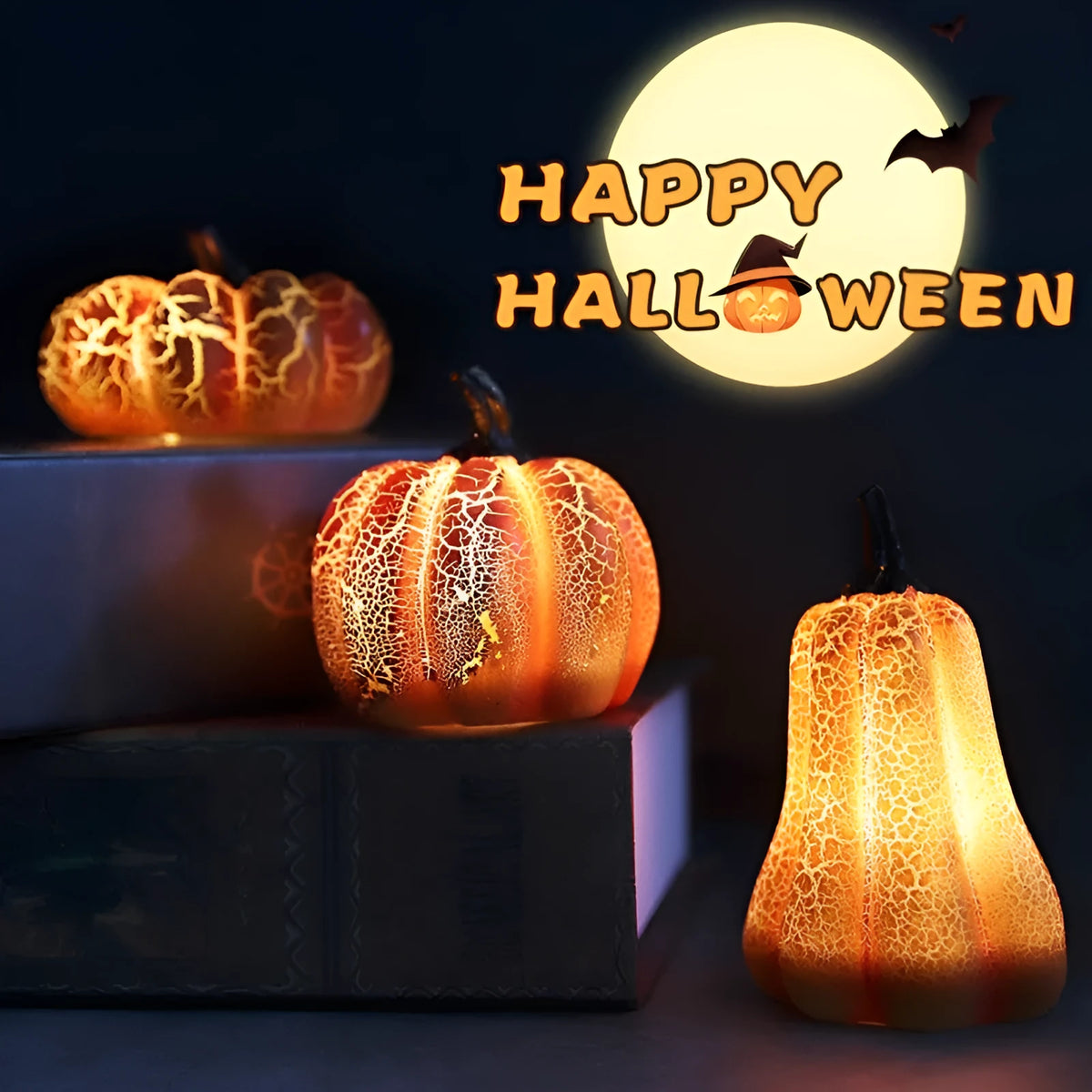 Set of three resin Halloween pumpkin lanterns with LED lights in long, medium, and short sizes.