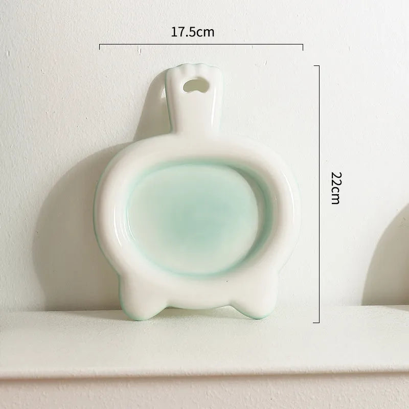 Ceramic cat bowl in blue colour with shallow mouth design for pet food and water.