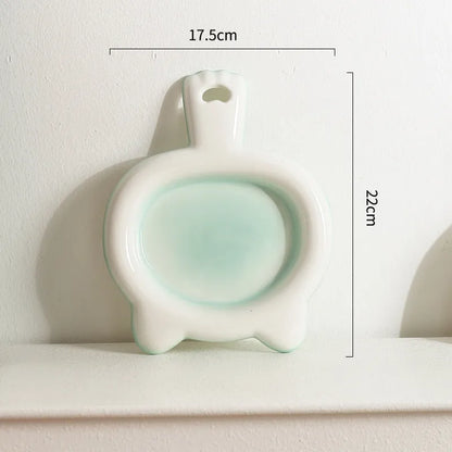 Ceramic cat bowl in blue colour with shallow mouth design for pet food and water.