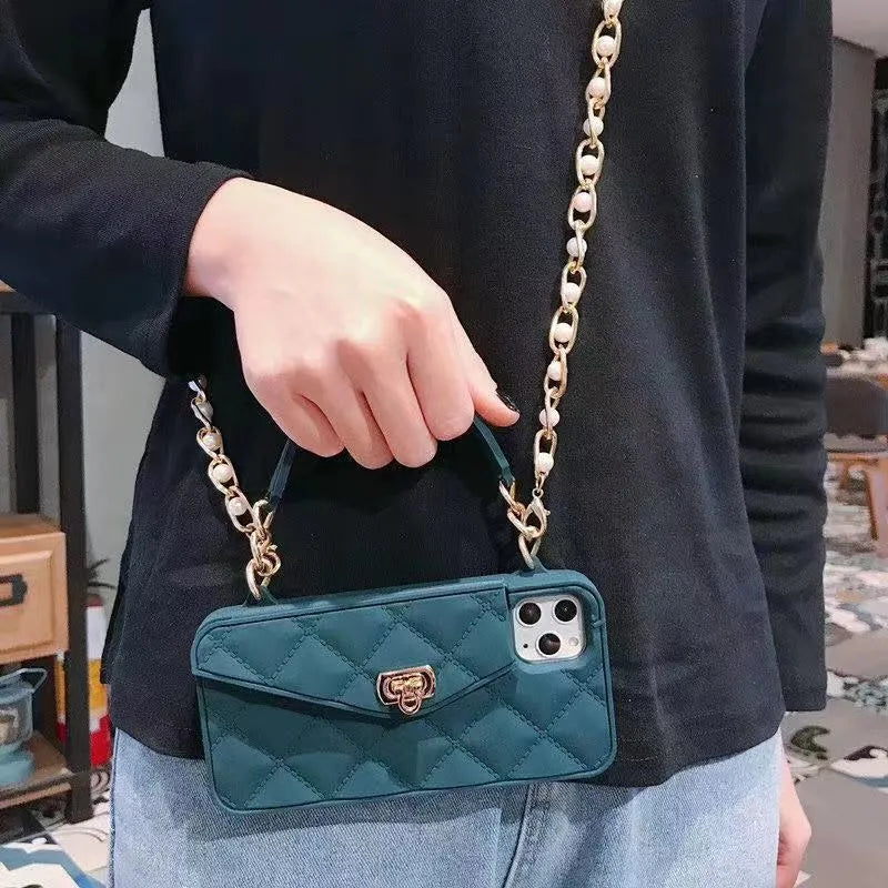 Luxury women's silicone iPhone case with pearl chain lanyard in beige, black, green, khaki, pink, or white