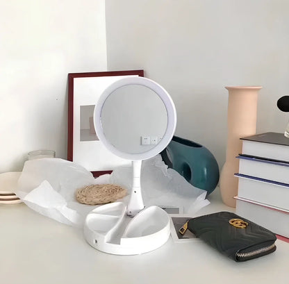 White acrylic double-sided LED vanity mirror showing magnification and normal sides with USB charging port