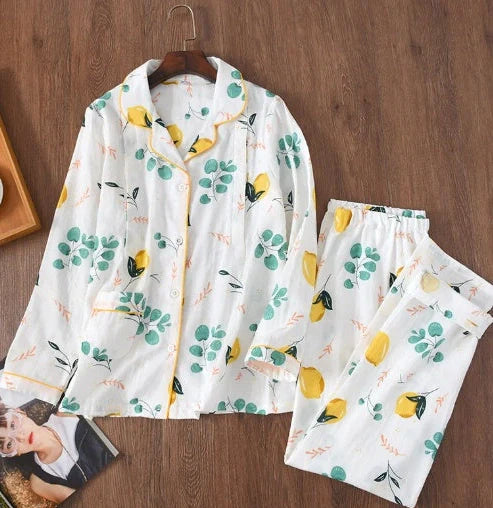 Traditional maternity pajama set with 100% cotton batik fabric, ankle-length trousers, and full-length bell sleeves
