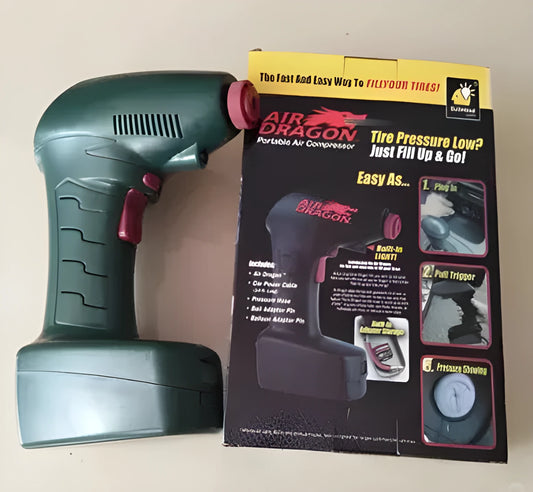 Portable car tyre pump with digital display showing pressure reading, connected to tyre valve
