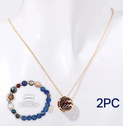 A natural stone beaded necklace and matching adjustable bracelet laid flat.