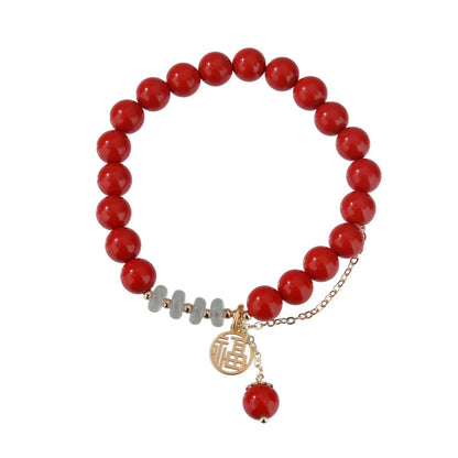 Retro red cinnabar fu character bracelet with jade beads and a long tassel