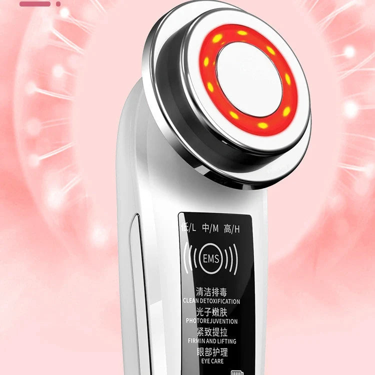 Pink and white facial massager for deep pore cleansing and skin rejuvenation with light therapy