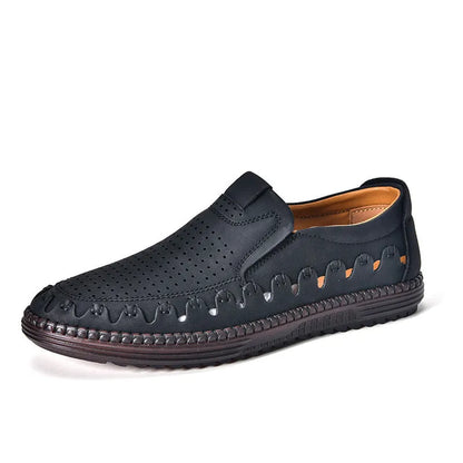 Men's brown slip-on casual shoes with round toe and flat sole shown on a white background