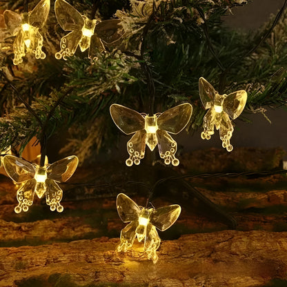 Solar butterfly dragonfly string lights in garden with IP65 protection, multiple lengths and warm or colour light options