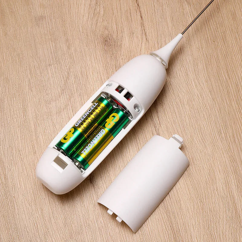 Hand-held electric milk frother in black or white colour, modern design for frothing and blending beverages
