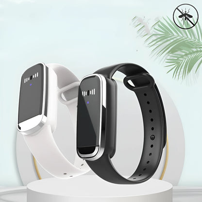 Ultrasonic mosquito repellent wristband in black and white colours showing compact wearable design