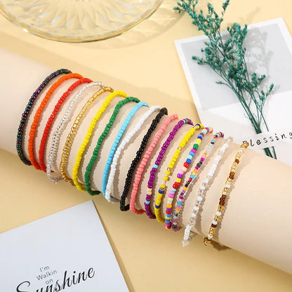 Handmade bohemian beaded bracelet set with 17 mixed material pieces in Set colour