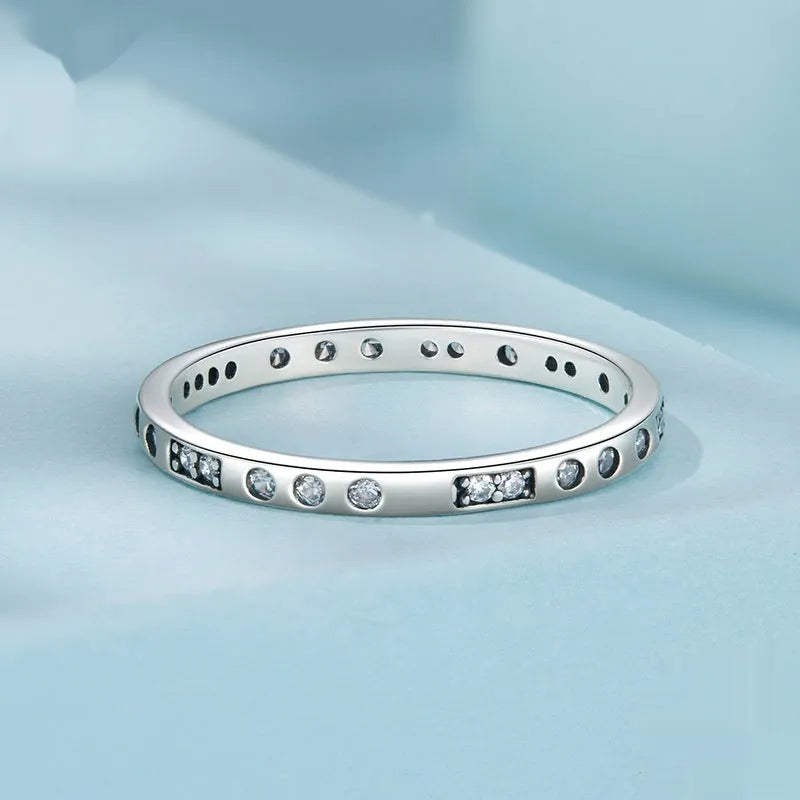 Silver-coloured alloy Moss Password I Love You ring with an oxidised black finish on a simple bracelet band.
