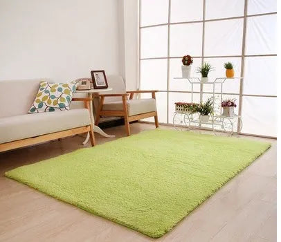 Solid colour plush area rug showing velvet pile texture and rectangular shape