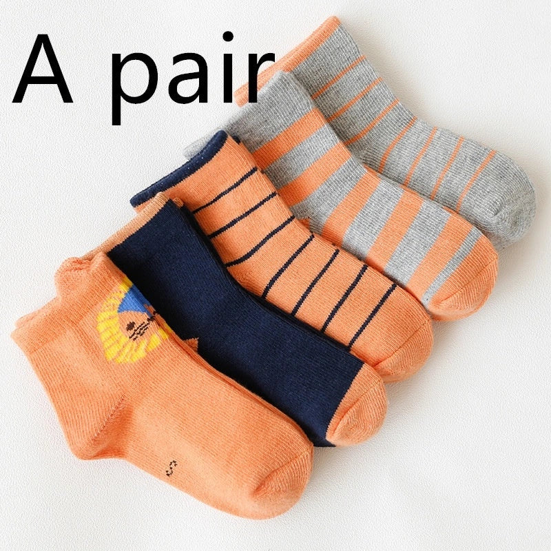 Kids' cartoon stockings with jacquard designs in various colors and patterns