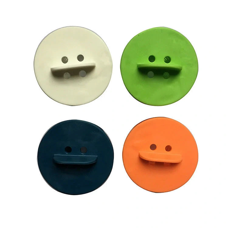 Anti-clogging Plastic Sink Filter in blue, green, orange, and white colors