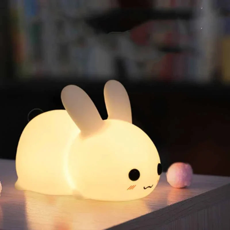 Dimmable rabbit-shaped night light with soft silicone design and adjustable brightness for children's bedrooms