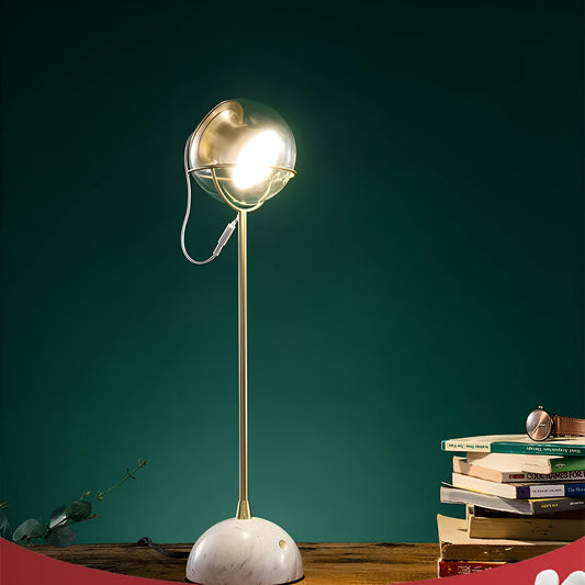 Creative glass shade desk lamp with touch dimmer switch on a wooden desk