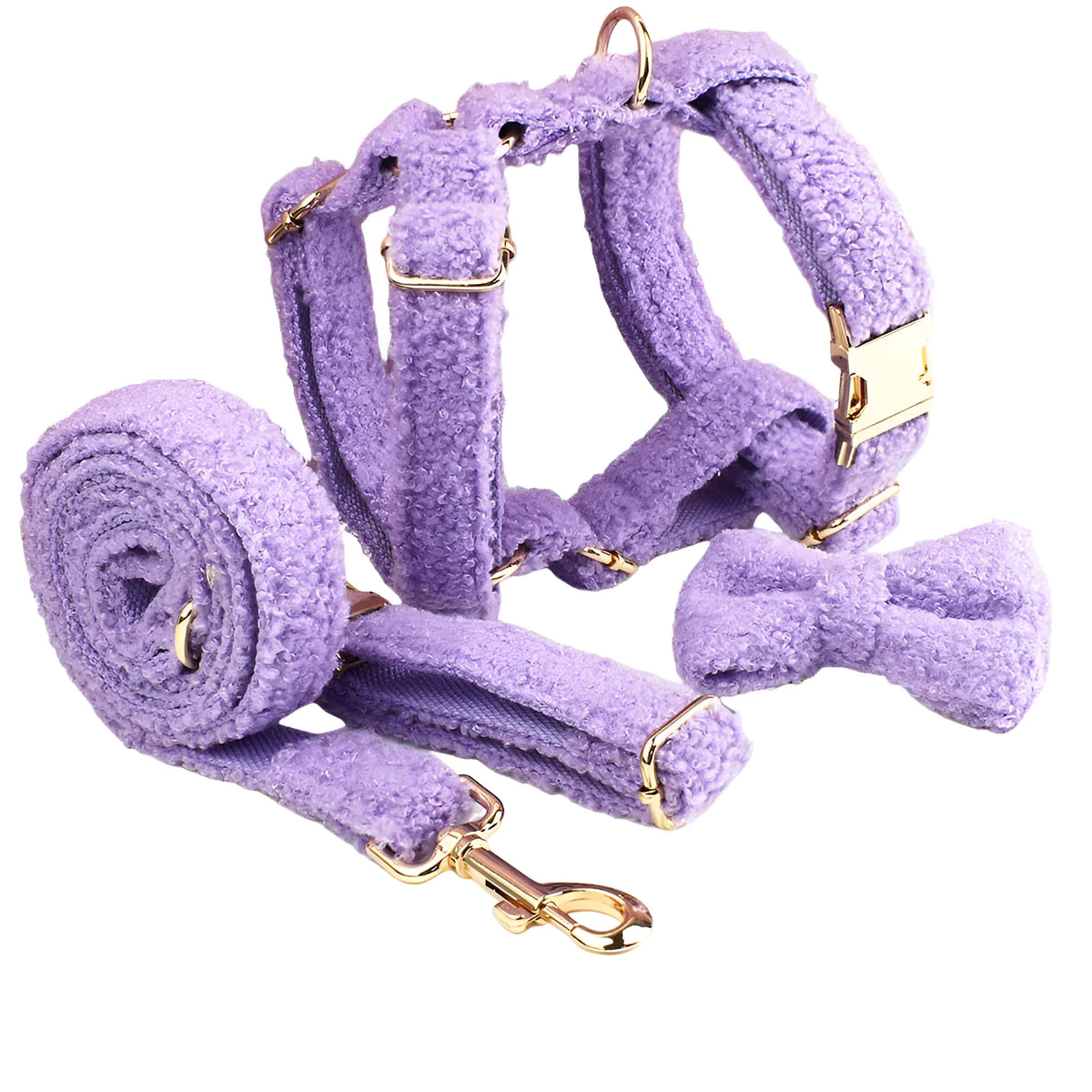 Cloth dog accessory set showing collar, leash, bow, and vest in coordinating fabric