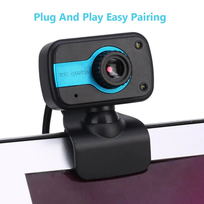 Blue, red, or white mini USB webcam on a stand with a 360-degree rotating head and manual focus adjustment.