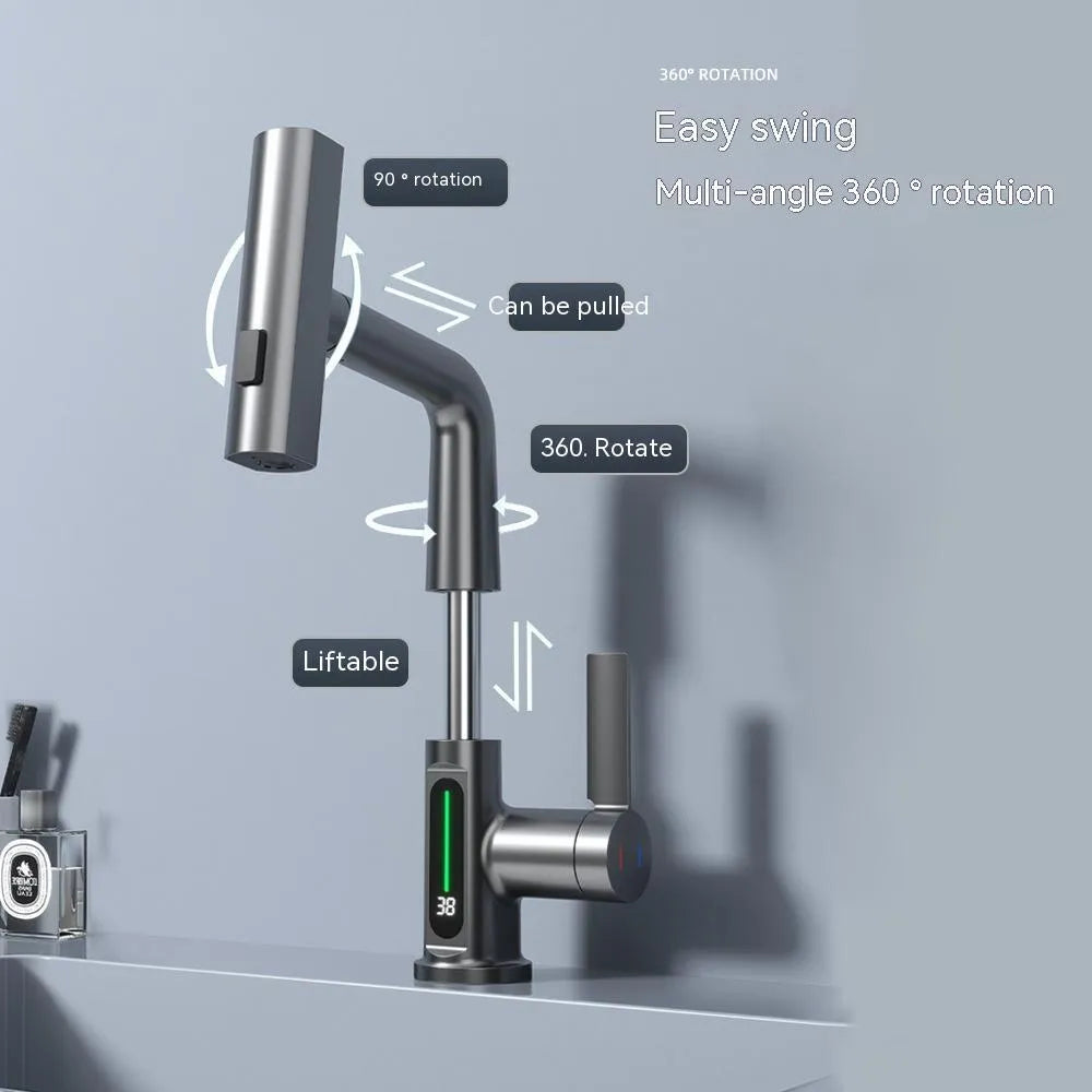 Modern digital display kitchen tap with pull-out spray hose showing LED temperature screen.