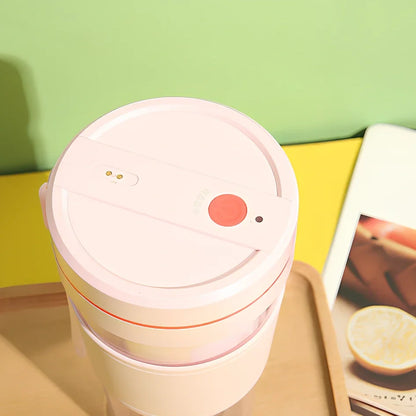 Black portable juicer cup with 304 stainless steel blades, 8cm diameter, magnetic charging port