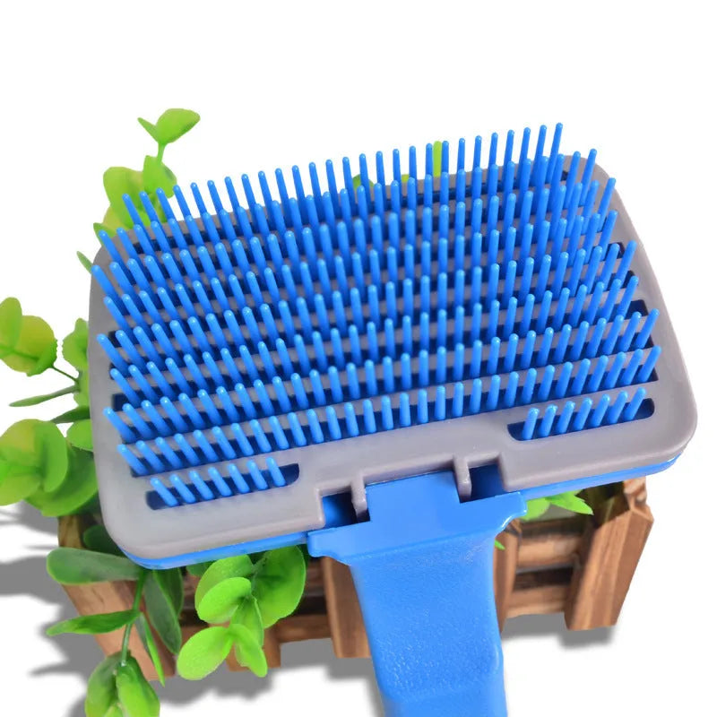 Self cleaning pet brush comb for dogs and cats, plastic grooming tool measuring 16 x 10cm