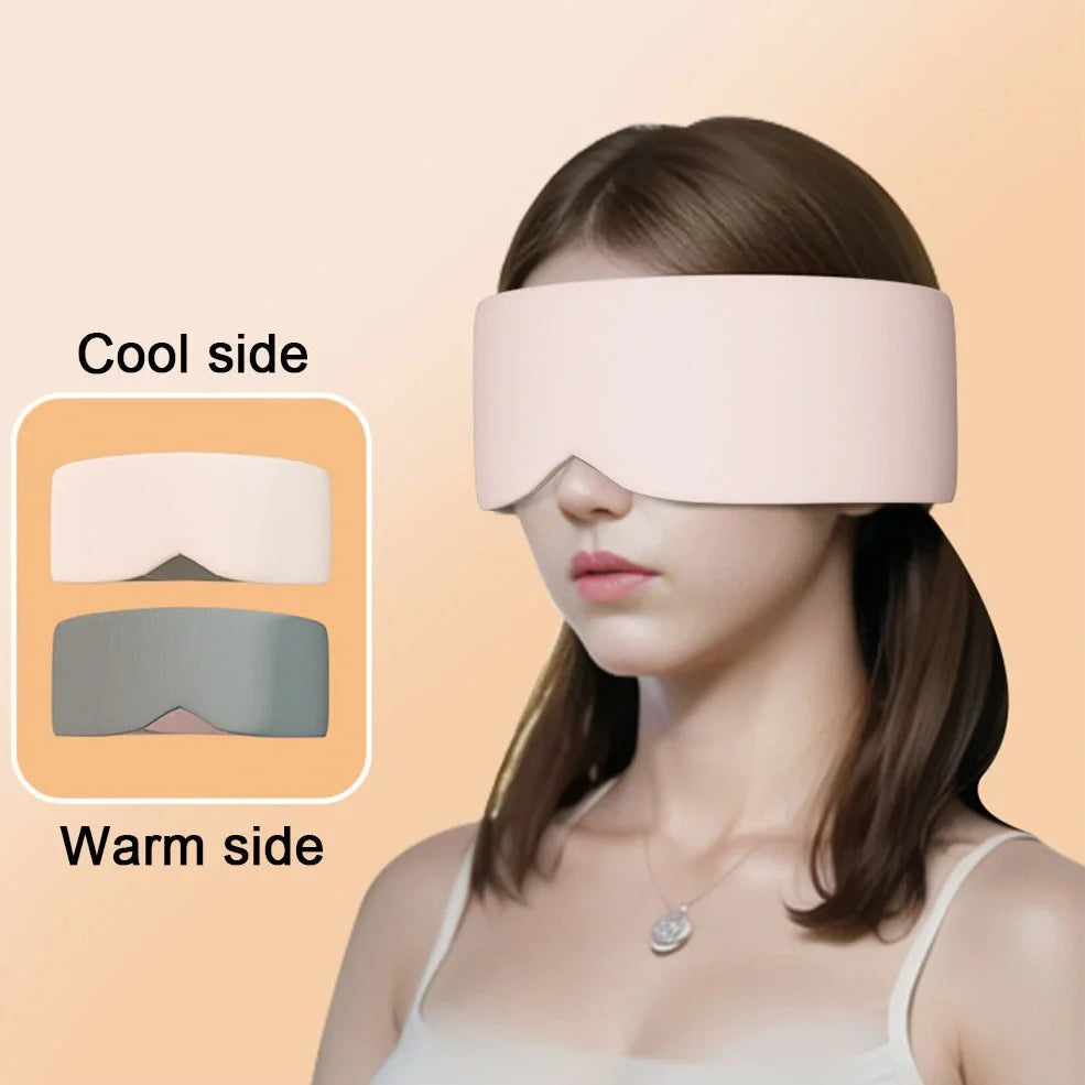 Gray double-sided sleep mask showing cool ice silk side and warm cotton side with adjustable magic tape closure