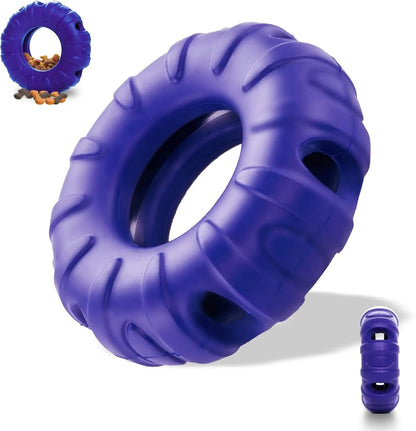 Blue tyre-shaped dog chew toy with oval openings, made from natural rubber for slow feeding