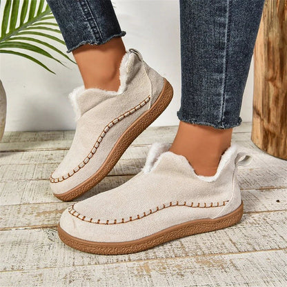 Stylish plush ankle boots for women featuring a unique V-cut design, soft interior, and durable materials for warmth and comfort in cold weather.