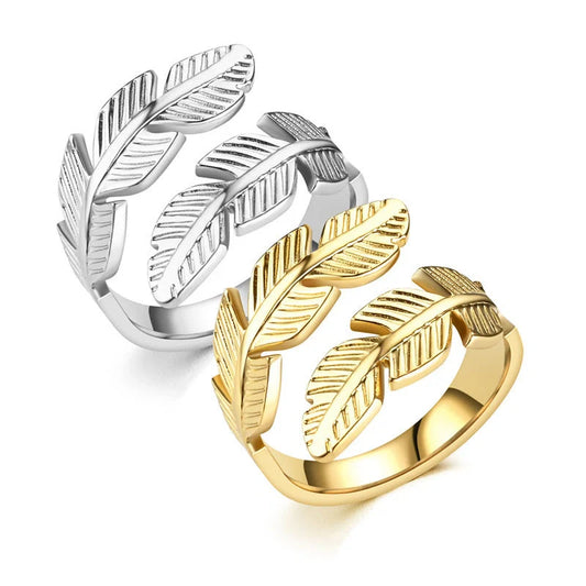 Adjustable feather ring in titanium steel with gold and silver options, featuring a unique handcrafted design.