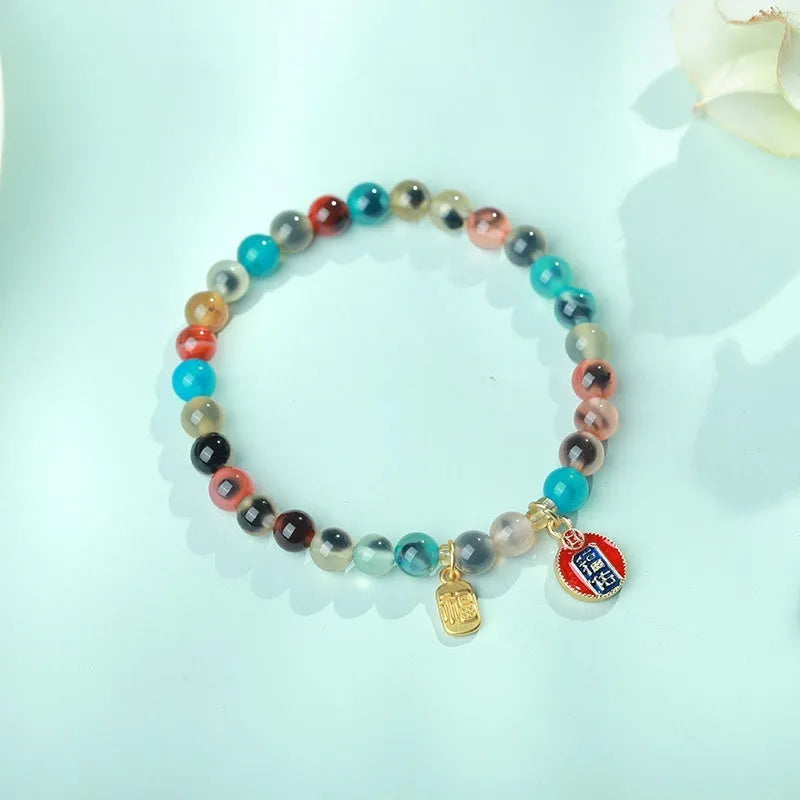 Women's natural agate bracelet with copper coin snake elements in geometric design