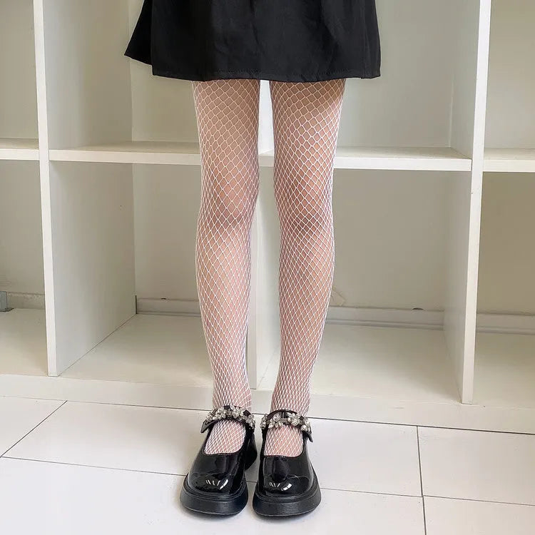 Women's black and white mesh stockings showing large, medium, and small hole patterns.