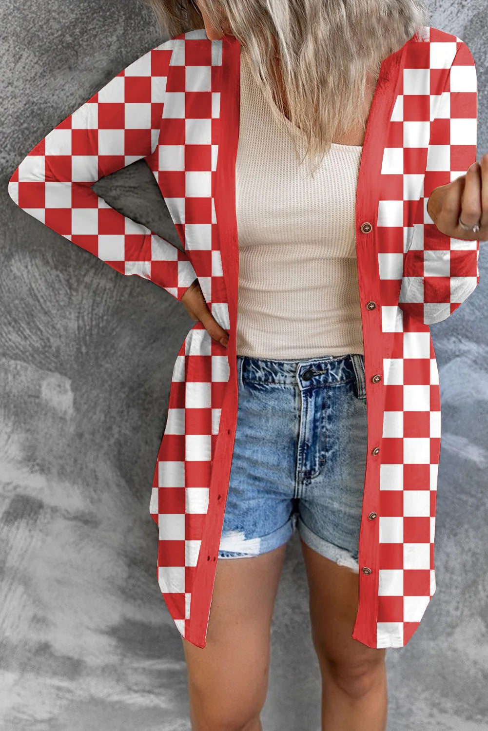 Women's long grey plaid knitted cardigan coat with loose fit and regular sleeves on a hanger