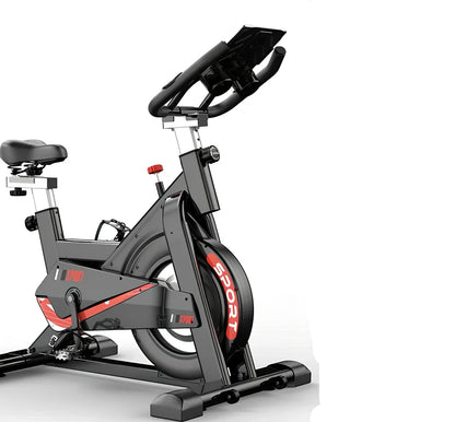 Black upright spinning bike with infinite resistance display for silent home fitness tracking distance and calories