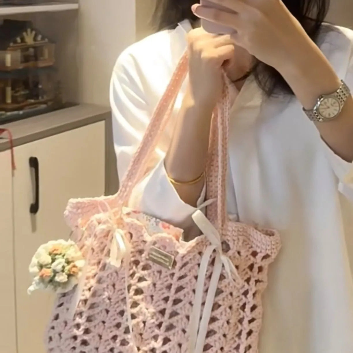 Handmade woven wool bag with floral pattern, approximately 0.5m tall
