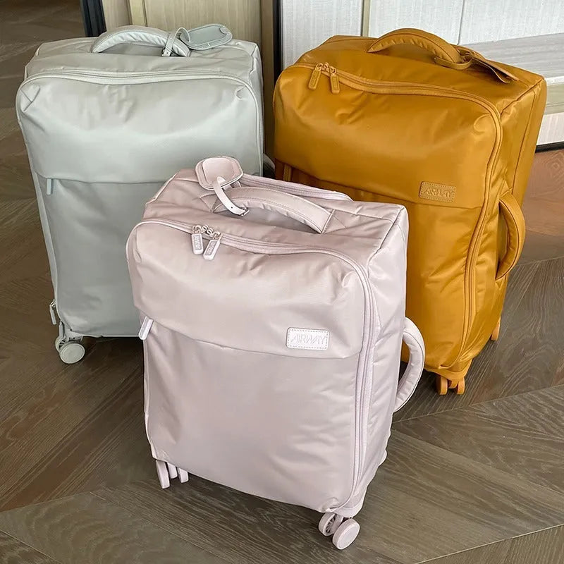 Ultra-light waterproof Oxford cloth suitcase in bluestone green with universal wheels and breathable lining