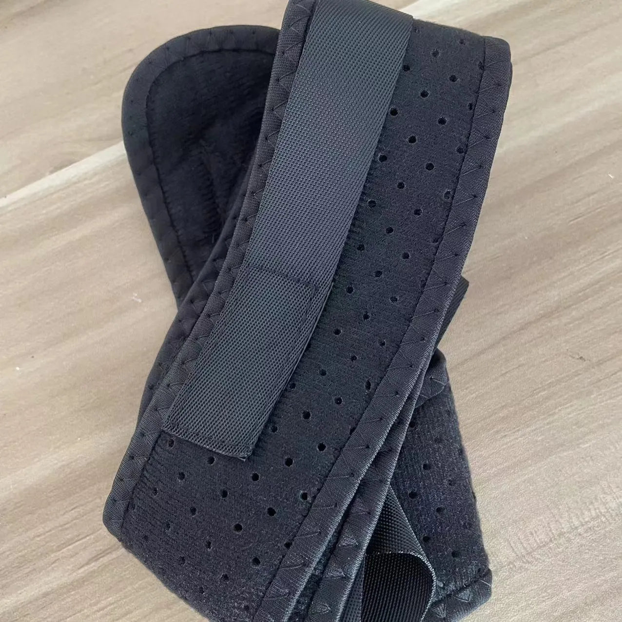 Nylon back correction band with adjustable straps for posture support during sitting