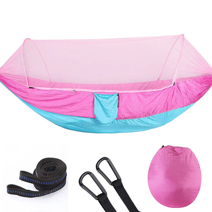 Cozy outdoor hammock with mosquito net for relaxing in nature and outdoor adventures
