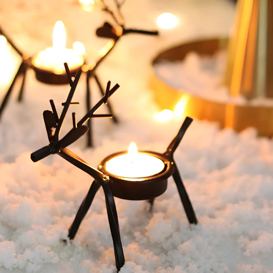 Black iron Christmas candlestick holder with elk bracket design and Santa Claus motifs