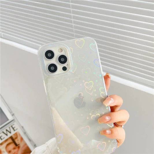 Laser colourful love silicone phone case with transparent colour and laser-etched motifs, shown on an iPhone.