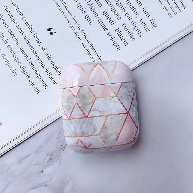 White marble hard PC protective case for AirPods charging box showing scratch protection