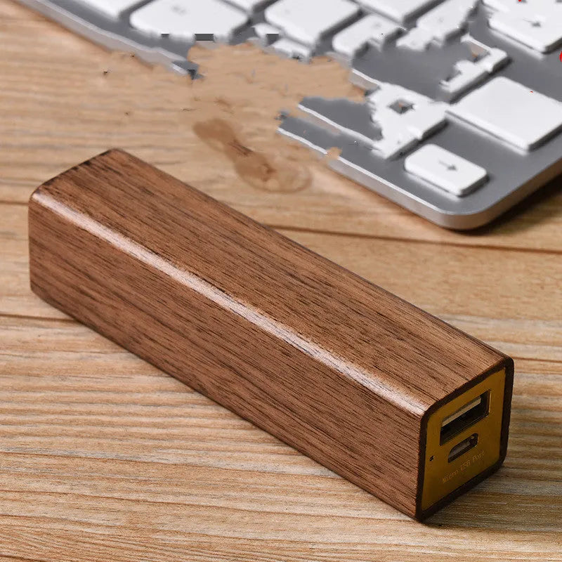 Brown walnut wood portable power bank with 2000mAh capacity showing compact rectangular design