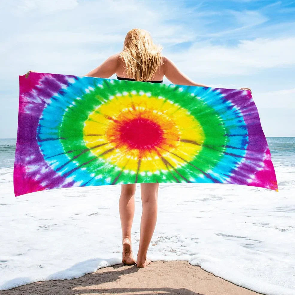 Square beach towel with tie-dye pattern showing superfine fibre texture and vibrant colours