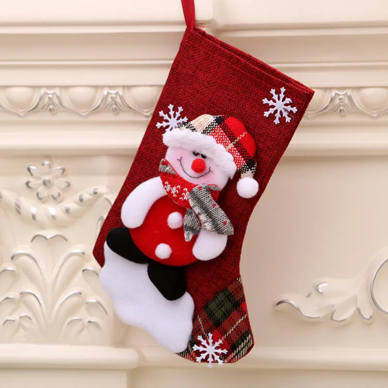 Multicolour Christmas hanging socks and gift bag with old man, snowman, deer, and bear designs