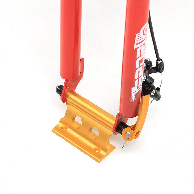 Silver metal quick-release clamp for attaching a bicycle front fork to a vehicle rack.