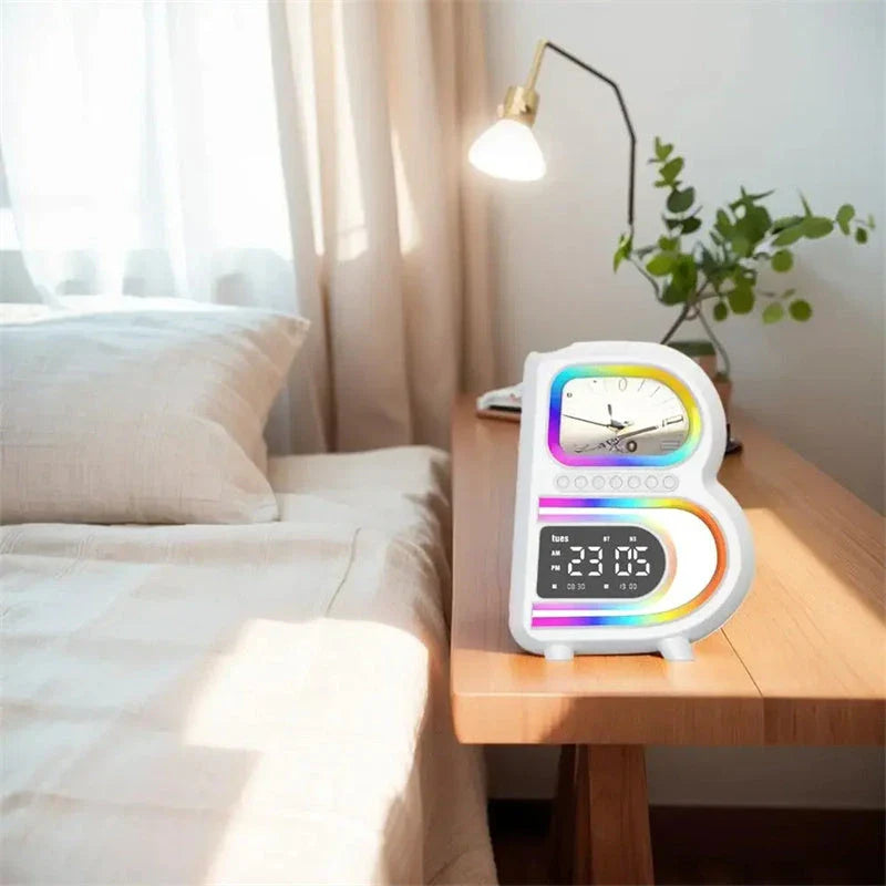 B-shaped Bluetooth speaker with wireless charging, adjustable lighting, and alarm clock functionality