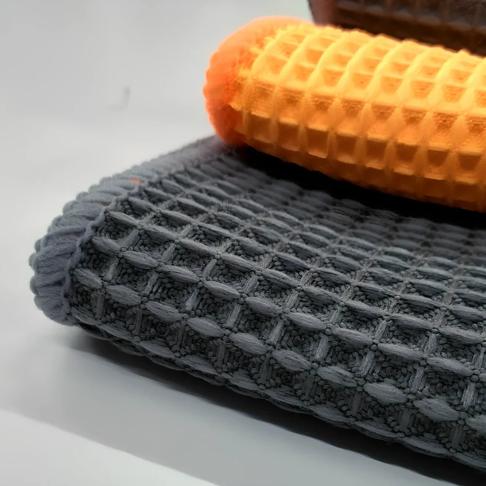 Orange and grey 40x40cm wafer-style car wash towel with microfiber texture