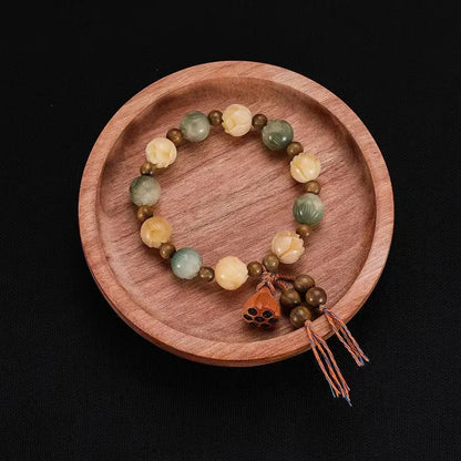 White Bodhi root bracelet with carved pumpkin lotus beads including Apple Orchard and Duobao styles