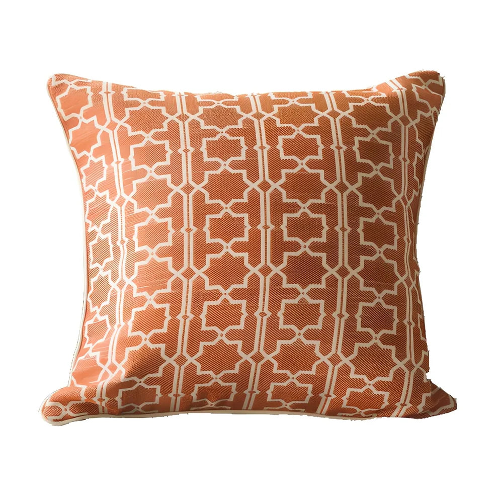 Square beige cushion cover with envelope closure on a grey sofa