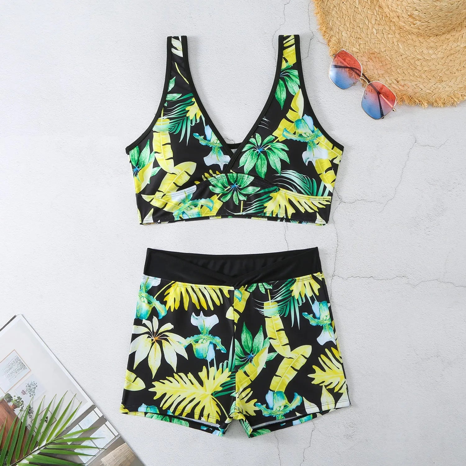Women's two-piece printed swimsuit set with boxer-style briefs and sleeveless top in multi-colour pattern